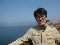 文 光明 先生